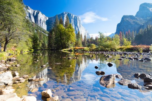 The view from within Yosemite Valley and Northside Drive of surrounding rock faces on a sunny autumn morning in California, USA