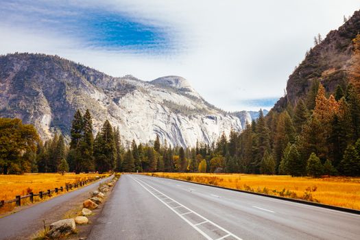 The view from within Yosemite Valley of surrounding rock faces on a stormy day in California, USA