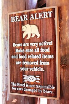 Yosemite, USA - October 14th 2016: Bear warning sign at Ahwahnee Hotel in the center of Yosemite Valley in California, USA