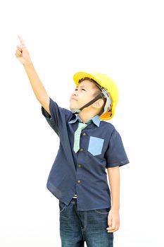 A boy wearing a helmet is pointing his hand isolated on white background with clipping path-concepts for the future is growing up to be an engineer.