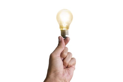 Man's hand holding an incandescent bulb isolated on white background with clipping path concept for energy savings.