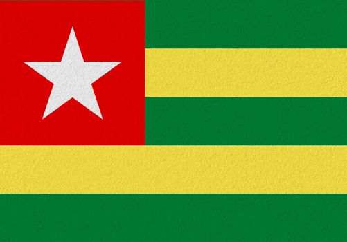 Togo paper flag. Patriotic background. National flag of Togo