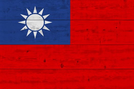 Taiwan flag painted on old wood plank. Patriotic background. National flag of Taiwan