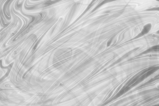 Black and white fluid pattern. Abstract painted background. Decorative marble texture. Black and white background