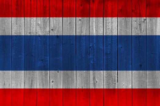 Thailand flag painted on old wood plank. Patriotic background. National flag of Thailand
