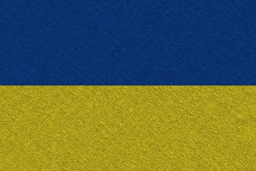 Ukraine fabric flag. Patriotic background. National flag of Ukraine