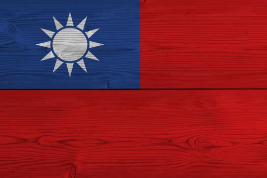 Taiwan flag painted on old wood plank. Patriotic background. National flag of Taiwan