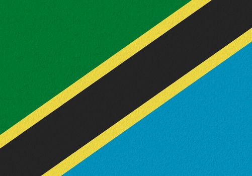 Tanzania paper flag. Patriotic background. National flag of Tanzania
