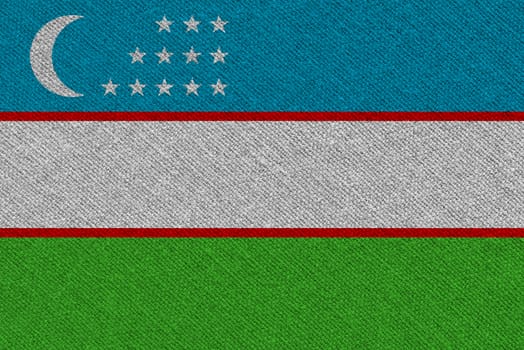 Uzbekistan fabric flag. Patriotic background. National flag of Uzbekistan