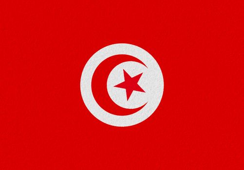 Tunisia paper flag. Patriotic background. National flag of Tunisia