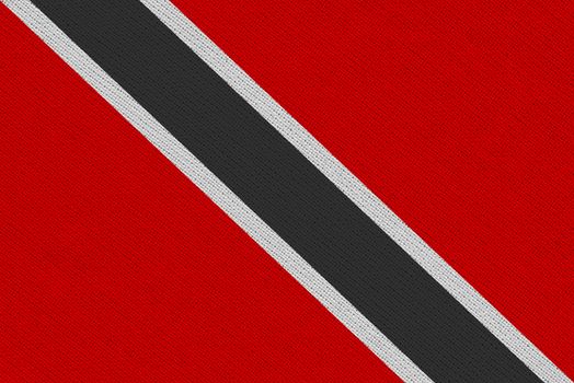 Trinidad and Tobago fabric flag. Patriotic background. National flag of Trinidad and Tobago