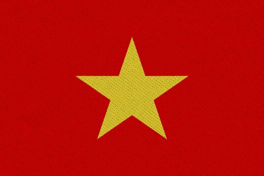 Vietnam fabric flag. Patriotic background. National flag of Vietnam