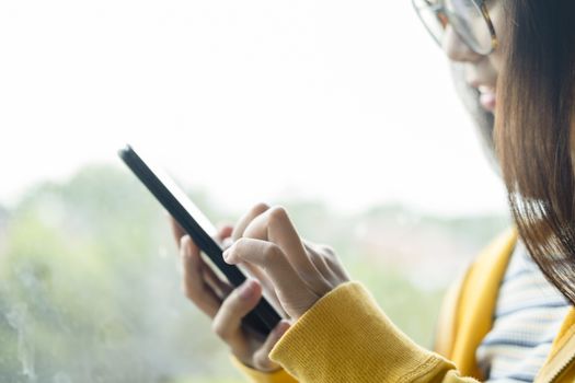 Young man using mobile phone. Using online connect technology for business, education and communication. 