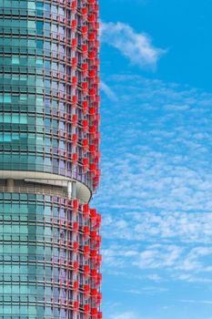 Close up of the International Towers in Sydney with the red flaps against the blue sky