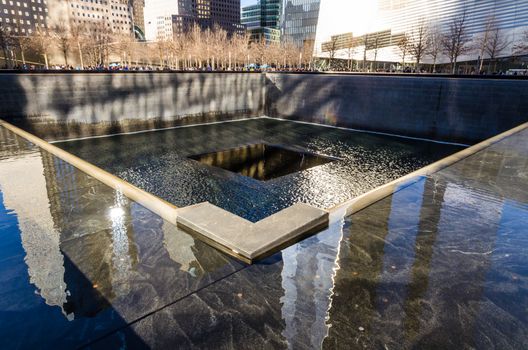 View of the 9 11 Memorial next to the One World trade centre in Manhattan, New York