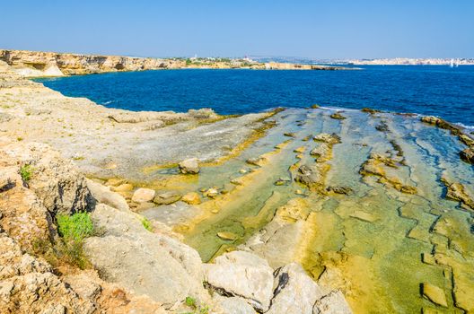 View of Marine Protected area of Plemmirio in a sunny day with blue sky, Syracuse, Sicily