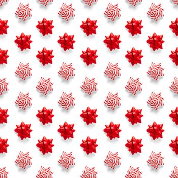 Seamless regular creative Christmas pattern with New Year decorations on white background. xmas Modern Seamless pattern made from christmas decorations. Photo quality pattern for fabric, prints, wallpapers, banners or creative design works.