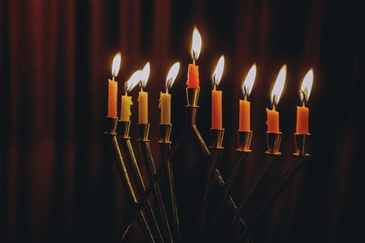 Jewish holiday Hanukkah menorah with burning candles
