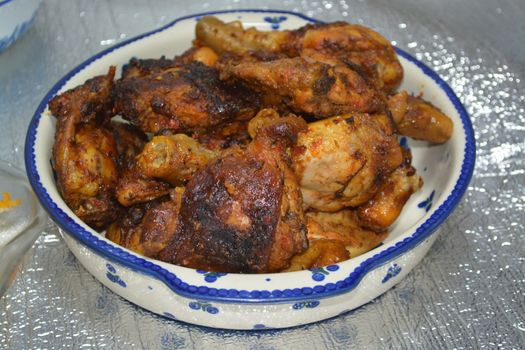 close-up view with selective focus of crispy basin pakora/pakoda or patties are popular indian or pakistani street food snack, served with green salad and sauce. Selective focus of