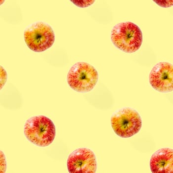 Seamless pattern with ripe apples. Apple seamless pattern on yellow background. Tropical fruit abstract background.