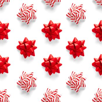 Seamless regular creative Christmas pattern with New Year decorations on white background. xmas Modern Seamless pattern made from christmas decorations. Photo quality pattern for fabric, prints, wallpapers, banners or creative design works.