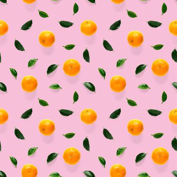 Mandarin seamless pattern, tangerine, clementine isolated on pink background with green leaves. Collection of fine Mandarine seamless patterns.