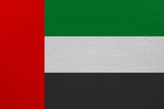 United arab flag on canvas. Patriotic background. National flag of United arab