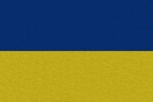 Ukraine flag painted on paper. Patriotic background. National flag of Ukraine