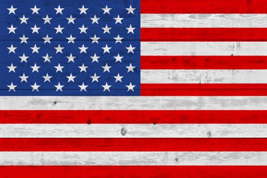 United States of America flag painted on old wood plank. Patriotic background. National flag of United States of America