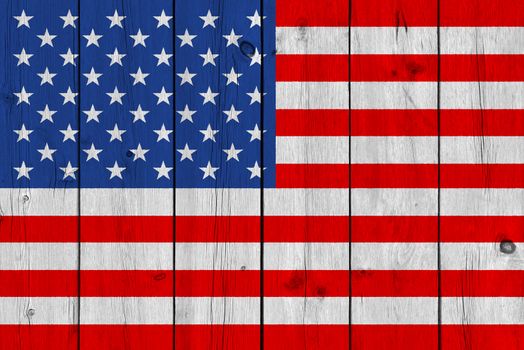 United States of America flag painted on old wood plank. Patriotic background. National flag of United States of America