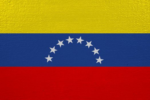 Venezuela flag on canvas. Patriotic background. National flag of Venezuela