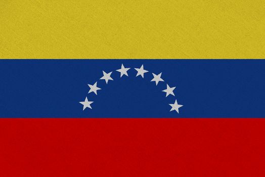 Venezuela fabric flag. Patriotic background. National flag of Venezuela