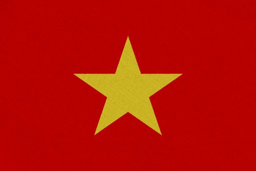 Vietnam fabric flag. Patriotic background. National flag of Vietnam