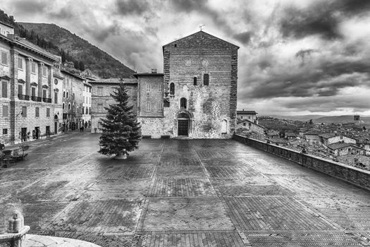 View of Piazza Grande, scenic main square in Gubbio, one of the most beautiful medieval towns in central Italy