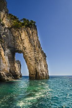 view of a reef from its summit to the sea with an opening in the same in the Ionian sea on the shores of the island of zakynthos