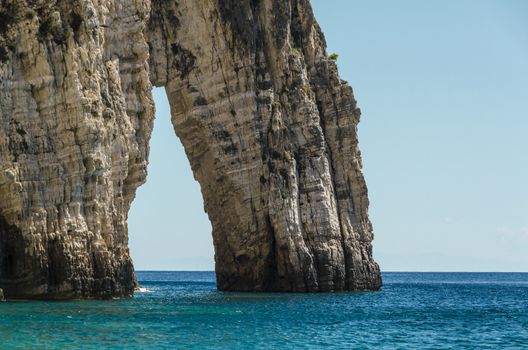 close view of a reef with an opening made by nature in the Ionian sea on the shores of the island of zakynthos