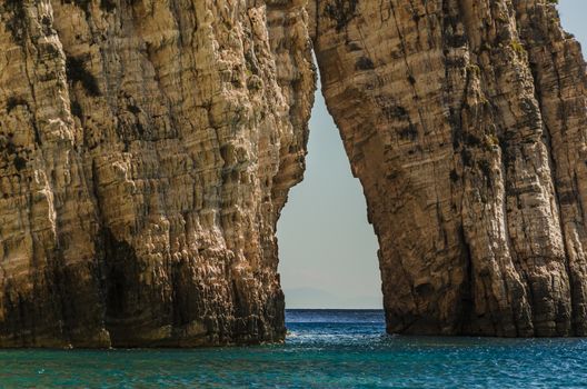 reef surface and opening pierced by the sea on the shores of the island of zakynthos in the Ionian sea