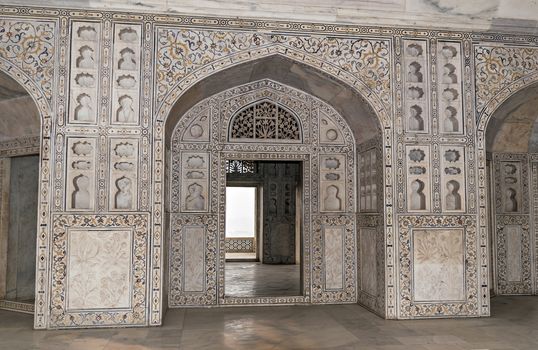 Exquisite carvings on entrance door of Red Fort in Agra, Uttar Pradesh, India.