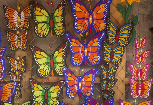 Colorful butterfly decorations in a Mexican market