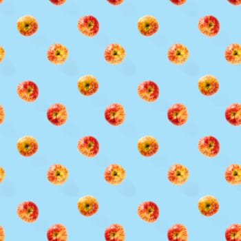 Seamless pattern with ripe apples. Apple seamless pattern on blue background. Tropical fruit abstract background.