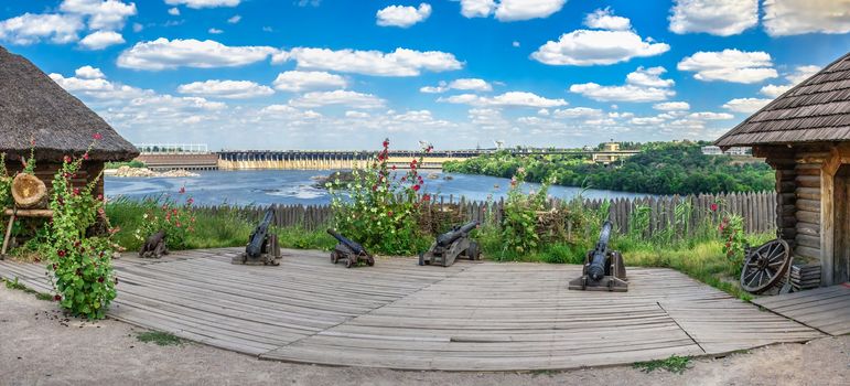 Zaporozhye, Ukraine 07.20.2020. Panoramic view of the Dnieper hydroelectric power station from the Khortytsya island in Zaporozhye, Ukraine, on a sunny summer day
