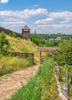 Zaporozhye, Ukraine 07.20.2020. External walls, wooden fence and watchtowers of the National Reserve Khortytsia in Zaporozhye, Ukraine, on a sunny summer day