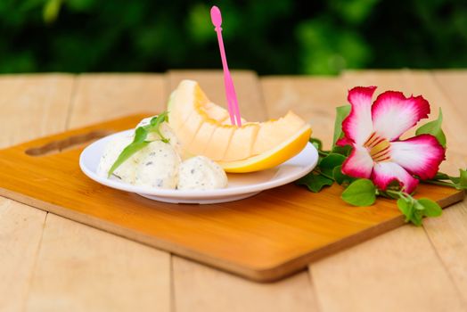 ice cream melon on wood table