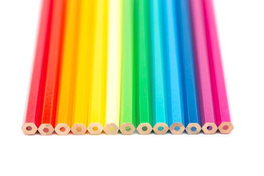 Lot of colorful wooden pencils on a white background