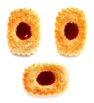 The Three cookies with a blob of jam in the middle on a white background