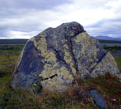Rocks in the taiga in the Russian north. Exit to the surface of granites and basalts.