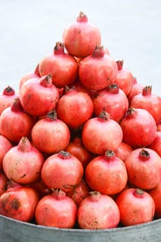 pyramid of freshly picked pomegranates