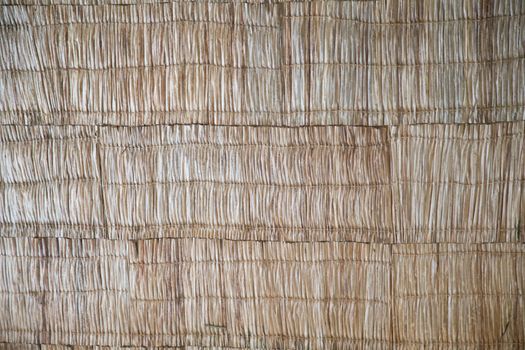 Background from straw material for roof coverings