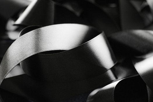 Black and white silk ribbon as background, abstract and luxury brand designs