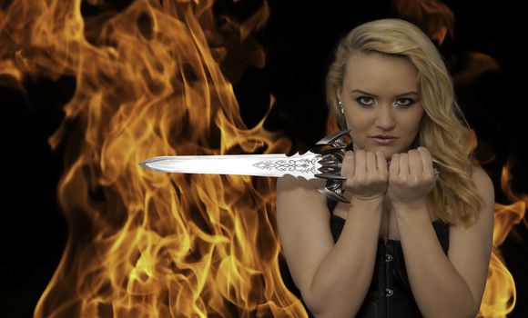 young blonde woman with a knife in the fire